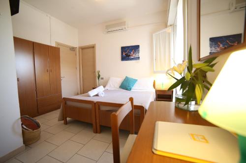 Posteľ alebo postele v izbe v ubytovaní Sportur Club Hotel