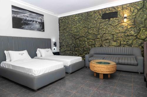 Mirembe Hotels - Source of the Nile Suitesにあるベッド