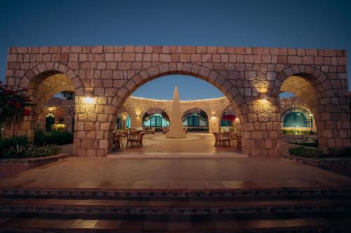 a view of the courtyard of a building at Seti Abu Simbel Lake Resort in Abu Simbel