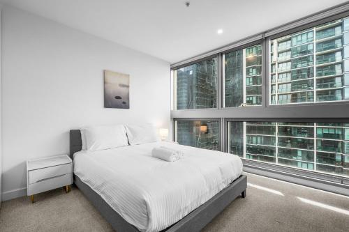 Luxurious apt In Southern Cross-Harbour Views 3B2B 객실 침대