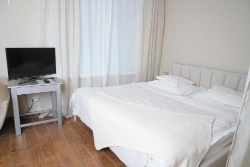 Postel nebo postele na pokoji v ubytování Bohemian