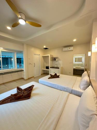 Ένα ή περισσότερα κρεβάτια σε δωμάτιο στο Euphoria Bungalow