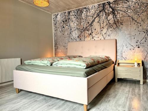 Postel nebo postele na pokoji v ubytování Villa Dalen, Natuurlijk Zweeds!