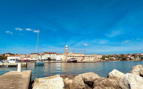 a view of a harbor with boats in the water at Villa LuiSole in Krk