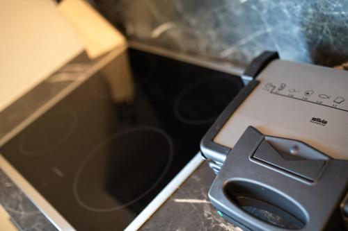 a electronic device sitting on a counter top at Villa LuiSole in Krk