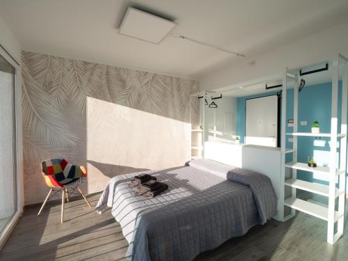 Postel nebo postele na pokoji v ubytování Orchidea House