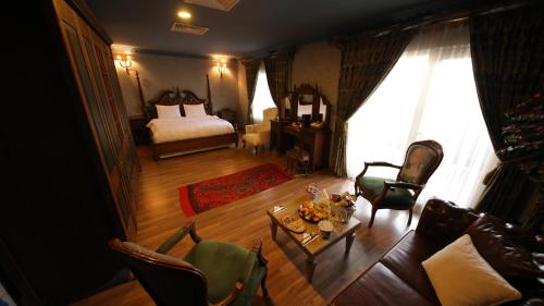 Una cama o camas en una habitación de Reform Hotel