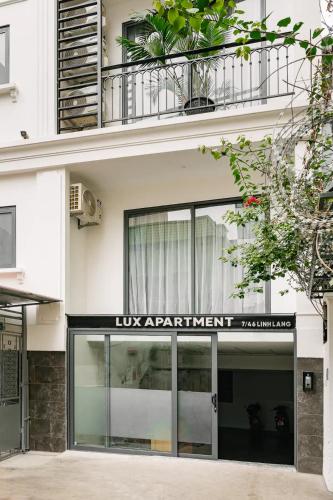 a building with a sign that reads lux apartment zimbabwe at Lux Japan Town Studio in Hanoi