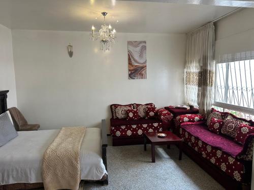 Ένα ή περισσότερα κρεβάτια σε δωμάτιο στο Emplacement idéal chambre Privée