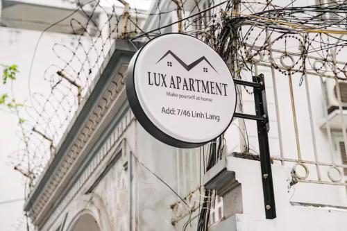 a sign for a luxury apartment on the side of a building at Lux Japan Town Studio in Hanoi