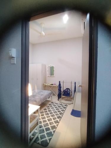 a view of a hospital room with a bed at Kenangan Homestay Kemaman in Kampong Chendar