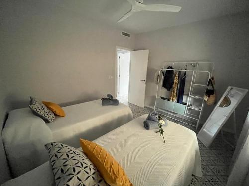 Ένα ή περισσότερα κρεβάτια σε δωμάτιο στο Montgó Vista Residence