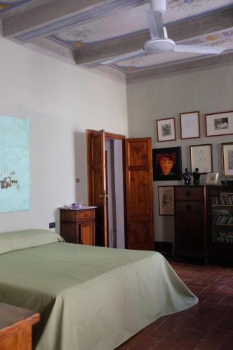 Postel nebo postele na pokoji v ubytování Casa del Podestà