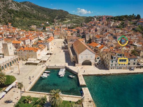 an aerial view of a city with boats in the water at Sun Spalato Fara in Hvar