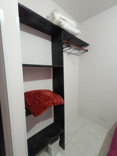 Ένα ή περισσότερα κρεβάτια σε δωμάτιο στο Quarto 2 Privado Confortável em Pontal do Sul