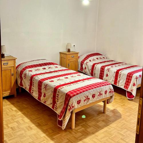 Ένα ή περισσότερα κρεβάτια σε δωμάτιο στο Casa Ai Pradi - Relax e avventura in Val di Sole