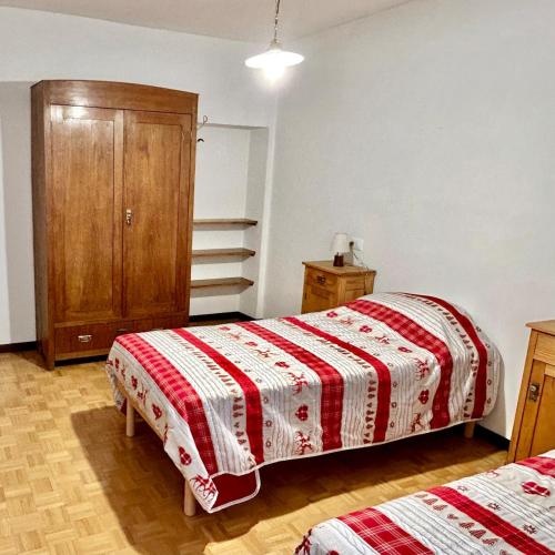Ένα ή περισσότερα κρεβάτια σε δωμάτιο στο Casa Ai Pradi - Relax e avventura in Val di Sole