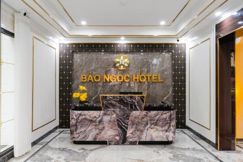 a lobby of a hotel with a sign that reads bao nacco hotel at Bao Ngọc Hotel Dương Nội in Hanoi