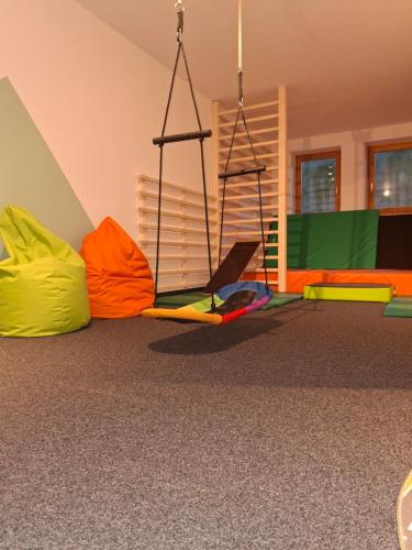a room filled with lots of different colored tents at Erlenhof in Maria Alm am Steinernen Meer