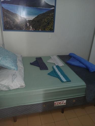 Cama o camas de una habitación en Hospedagem Brilho do Sol