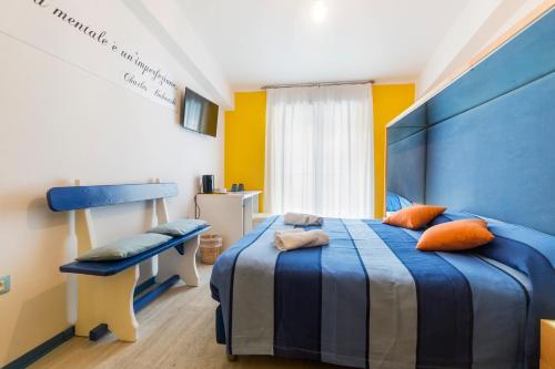 Кровать или кровати в номере La Favorita Hotel