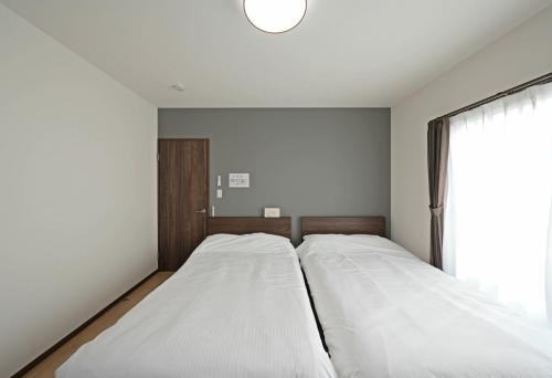 Fujiyama Stay100にあるベッド