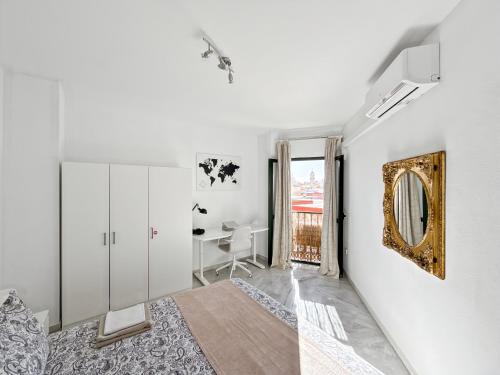 Exclusive Malaga Apartments with Cathedral Views and Auto Check-in
