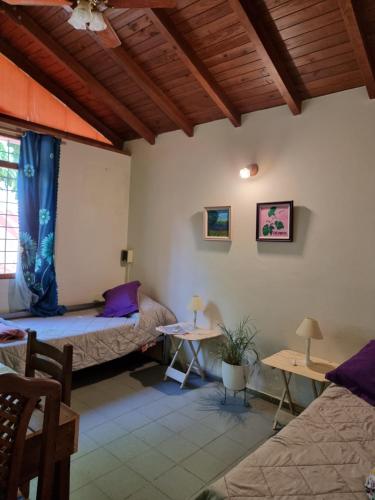 Ένα ή περισσότερα κρεβάτια σε δωμάτιο στο OASIS II Las Moras, con cochera y jardin