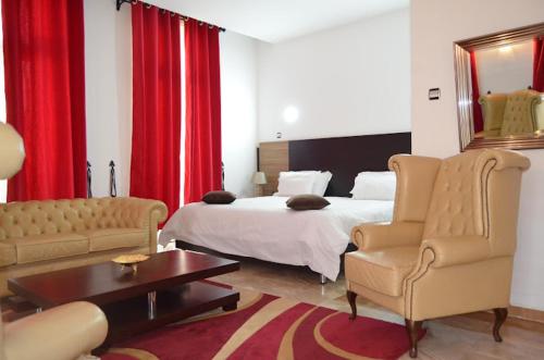 Postel nebo postele na pokoji v ubytování Hotel D'orient