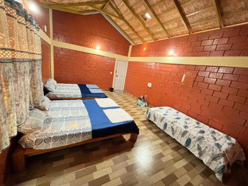 Postel nebo postele na pokoji v ubytování Coorg hill