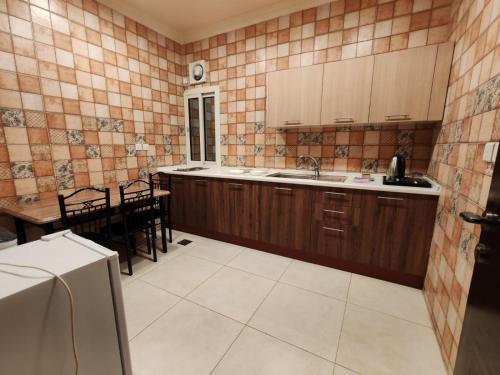 Dapur atau dapur kecil di المدى العربيةللشقق الفندقية
