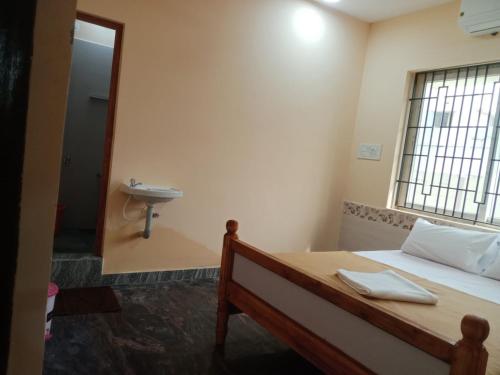 Postel nebo postele na pokoji v ubytování LJ Rooms