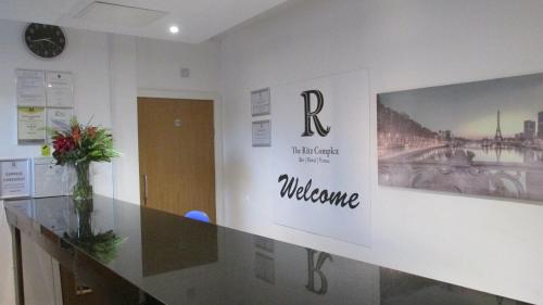 El lobby o recepción de Rooms at The Ritz Complex