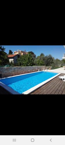 Studio Luce with shared pool sami-basement