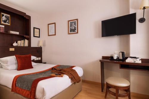 Ένα ή περισσότερα κρεβάτια σε δωμάτιο στο Jack's Hotel