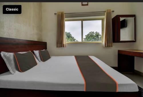 Postel nebo postele na pokoji v ubytování Hotel Mount View