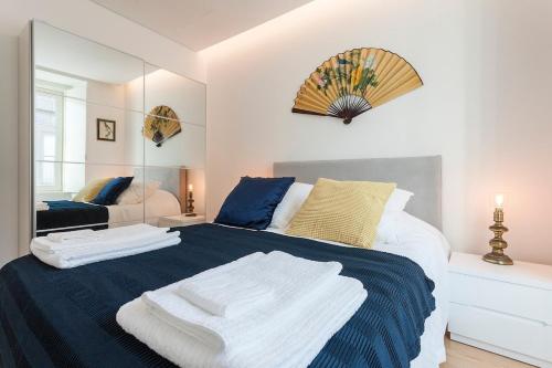 Postel nebo postele na pokoji v ubytování Photographer's Place Ferragial City Center Oasis