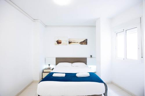 Voodi või voodid majutusasutuse Apartamentos Turísticos Centro Histórico, by CartagenaSpain toas