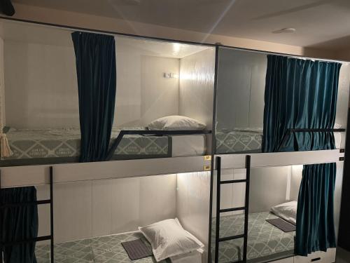 Кровать или кровати в номере A Hostel