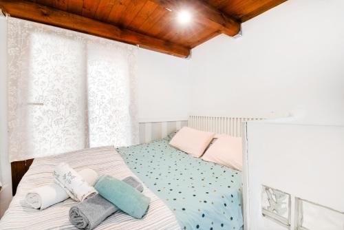 Postel nebo postele na pokoji v ubytování La casita azul de la playa