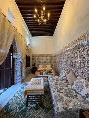 Postel nebo postele na pokoji v ubytování Riad Palais D'Or