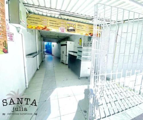 A cozinha ou cozinha compacta de Santa Julia Alojamiento