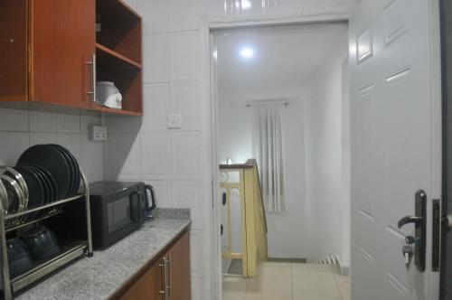 Kuchyň nebo kuchyňský kout v ubytování Atlantic Court Apartment