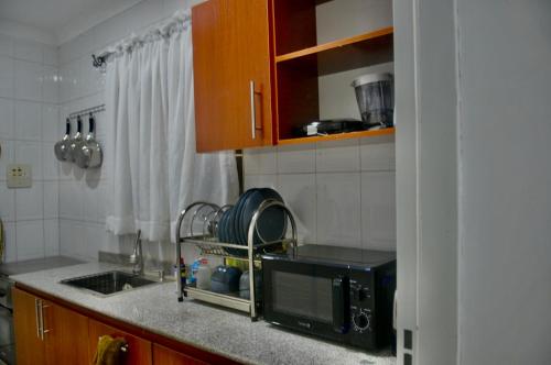 Kuchyň nebo kuchyňský kout v ubytování Atlantic Court Apartment
