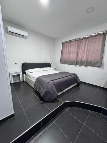 Postel nebo postele na pokoji v ubytování Hotel Le Pinede Relax