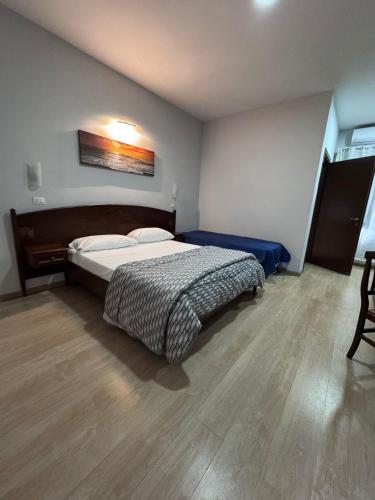 Hotel Le Pinede Relaxにあるベッド