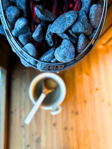 a basket of rocks with a spoon in it at Rezydencja Eger in Kazimierz Dolny