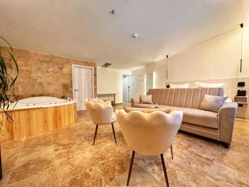 Posezení v ubytování Boutique Hotel Comtal Empuries