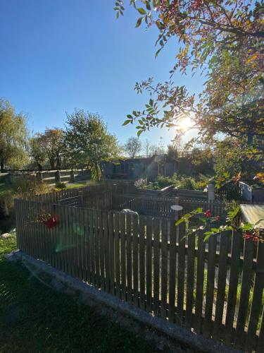 a wooden fence in front of a garden at Esperanzahof in Oberndorf an der Melk