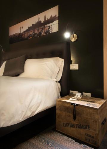 Postel nebo postele na pokoji v ubytování Hotel B&B il Mosaico